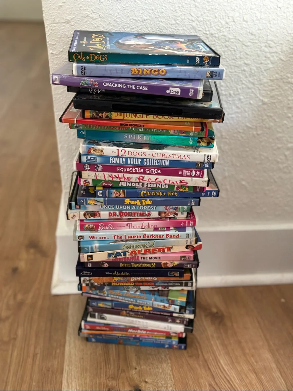 Stacked Assorted DVD Movies. Family genre